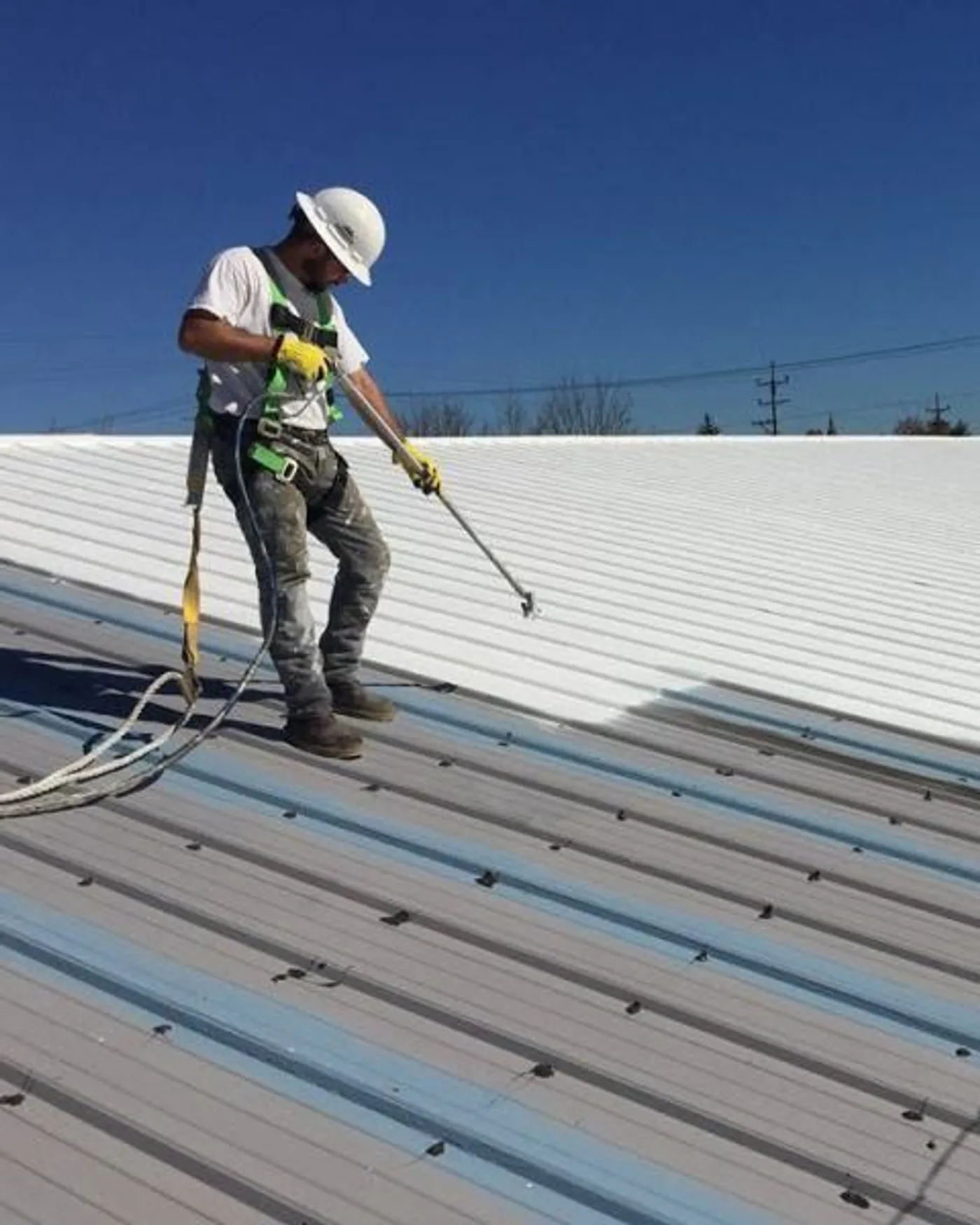 ART ROOFING crew working on a Capital Region home